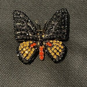 Elegant Black and Gold Butterfly Brooch